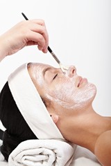 Young woman getting beauty treatment