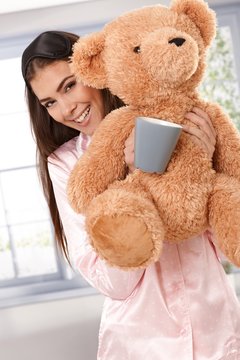 Happy morning portrait with teddy bear