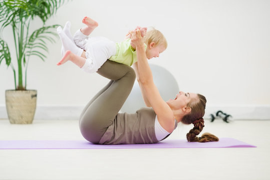 Healthy Mother And Baby Making Gymnastics