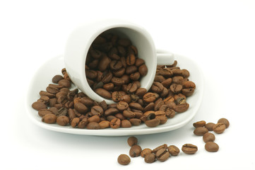 Coffee mug with coffee beans