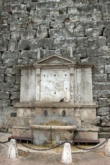 View of a fountain near of the city of Perugia