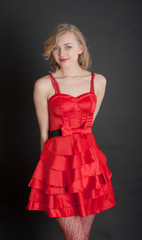 Fototapeta premium the blonde in a red
