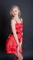 Fototapeta premium blonde in a red dress