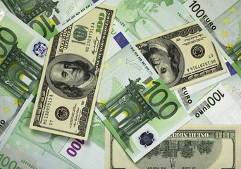100 Dollar and Euro banknotes background
