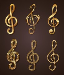 Vector set of golden decorative treble clef