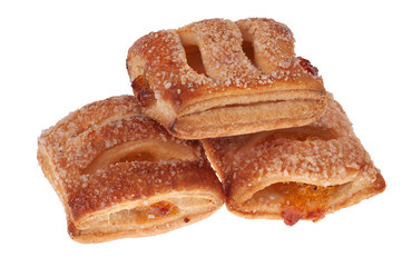 three buns with jam isolated on white