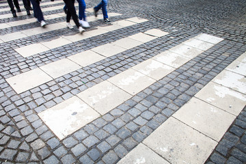 urban traffic concept - city street with a motion blurred crowd