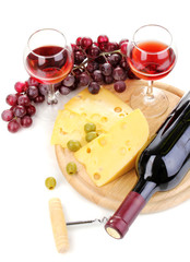 Bottle of great wine with wineglasses and cheese isolated