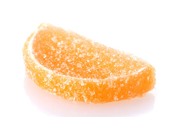 orange jelly candy isolated on white