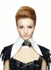 Portrait of the young girl in a black dress