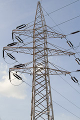 Electric power lines on a blue sky background - obrazy, fototapety, plakaty