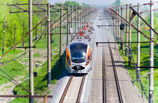 Fototapeta Modern fast passenger train in Ukraine