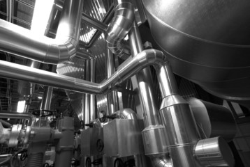 Equipment, cables and piping as found inside of  industrial powe