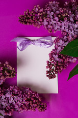 Greeting card with lilac flowers