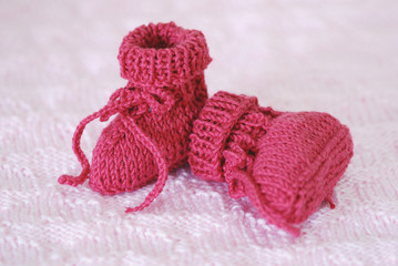 Fototapeta na wymiar Pink baby booties