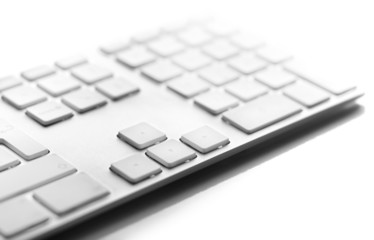 a close up of a white computer keyboard