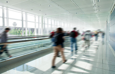 People crowd in rush at airport