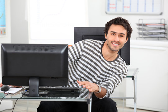 Young man at a computer