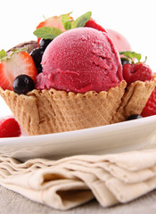 scop of ice cream and berries