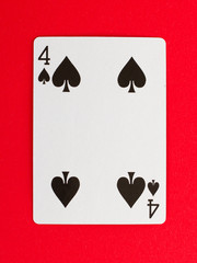 Old playing card (four) isolated