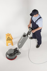 cleaning floor with machine