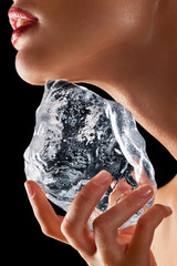 Woman holding ice to neck.