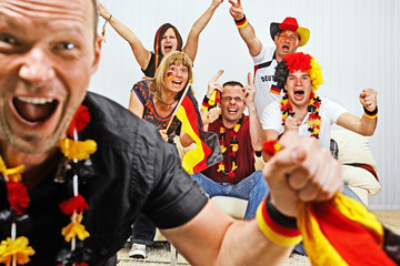 german soccer fans on the sofa