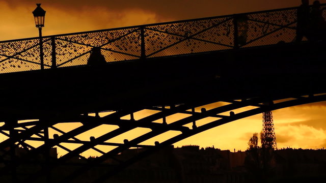 silhouette in the sunset, bridge in paris