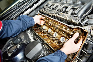 machanic repairman at automobile car engine repair