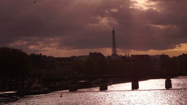 sunset after Paris city with Eiffel Tower and bridge