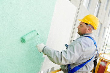builder facade painter at work