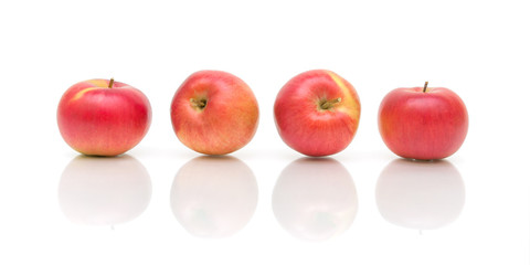 Ripe apples on a white background