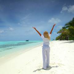 happy business woman on the ocean coast