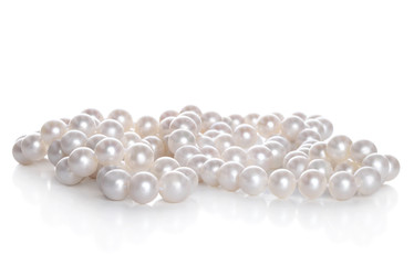String of pearls on white