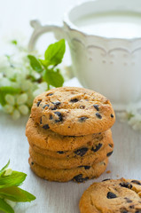 Chocolate chip cookies and cup of milk