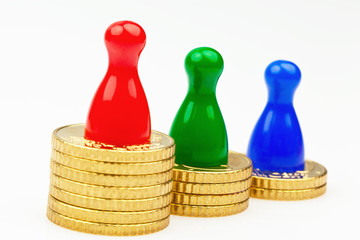 Spielfiguren auf Münzen