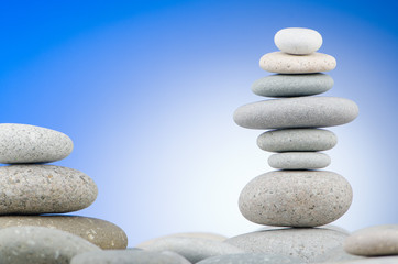 Pebbles stack against gradient background