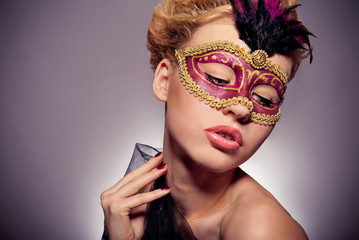 girl in a Venetian mask