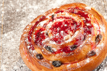 Homemade cream roll with strawberry jam