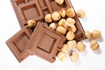 chocolate bar with nuts, on white background