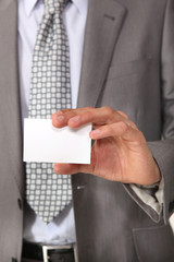 Executive with a blank businesscard