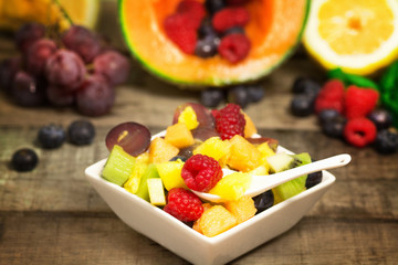 greedy fruit salad in a ceramic bowl