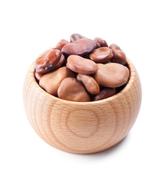 wooden bowl full of beans isolated on white