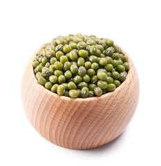 wooden bowl full of green mung beans isolated on white