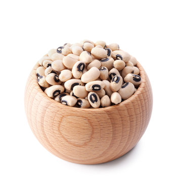 Wooden Bowl Full Of Black Eye Beans Isolated On White