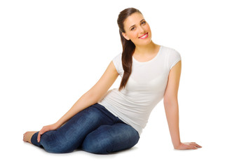 Young woman sitting on the floor
