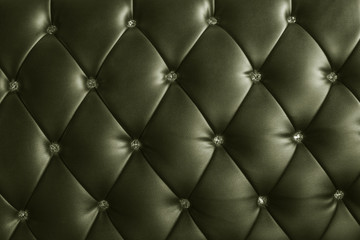 pattern of metalic green and gray leather with crystal decorated