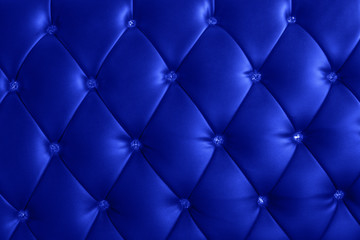 pattern and surface of blue sofa leather with crystal buttons