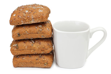 White cup and breakfast