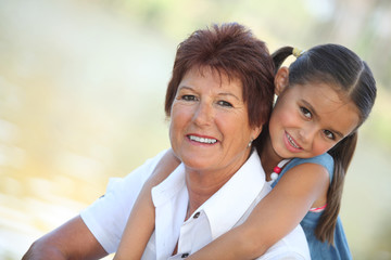 Obraz premium Mother and daughter in park
